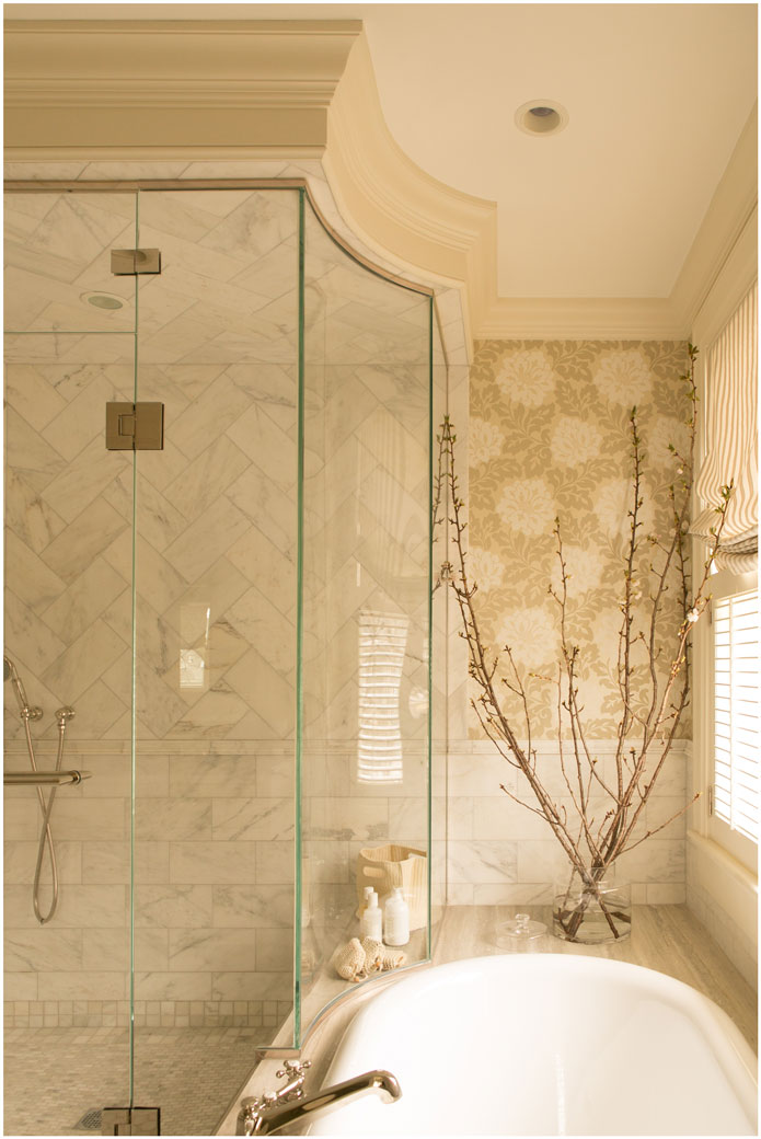 taste-design-inc-custom-glass-shower-with-chevron-marble-tile-and-tub-surround